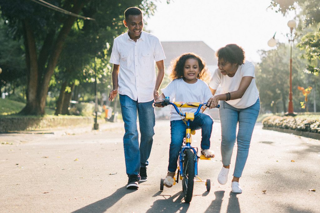 family riding bike